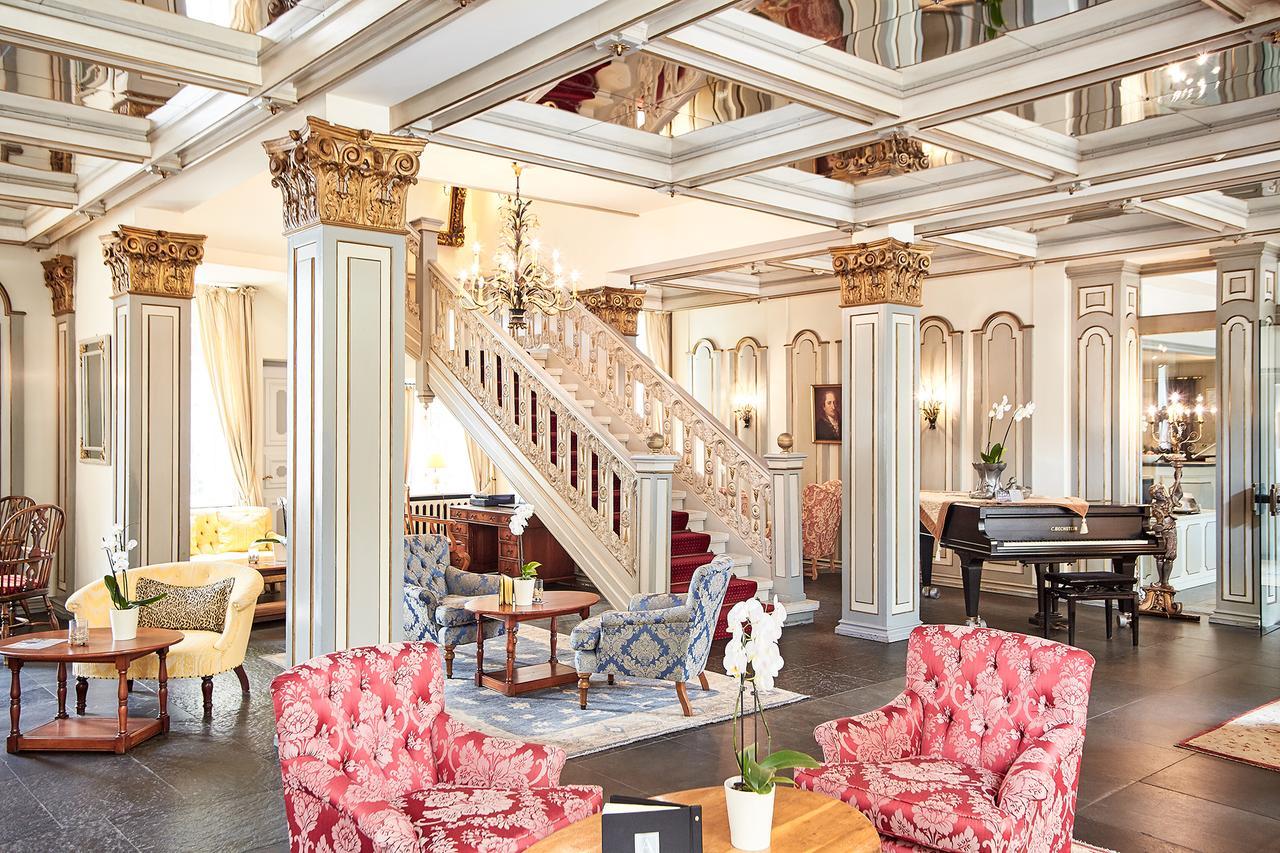 Althoff Hotel Fuerstenhof Celle Exterior foto The lobby of the Hotel de la Paix
